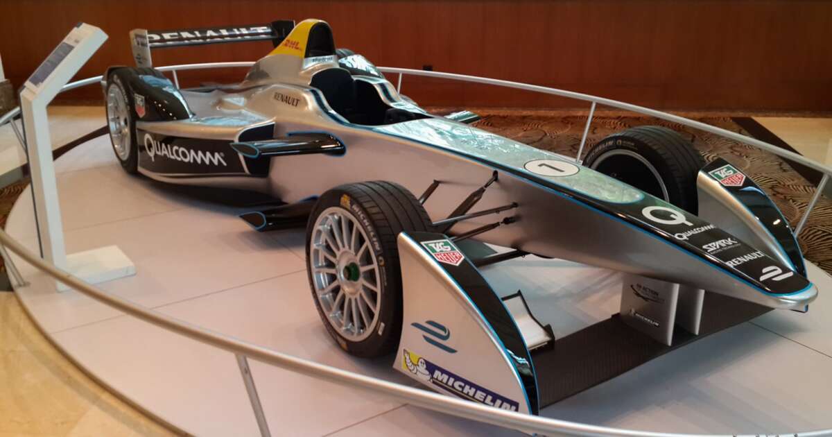 Formula E: São Paulo's Shocking Electric Thrill Ride Silver formula e race car on display